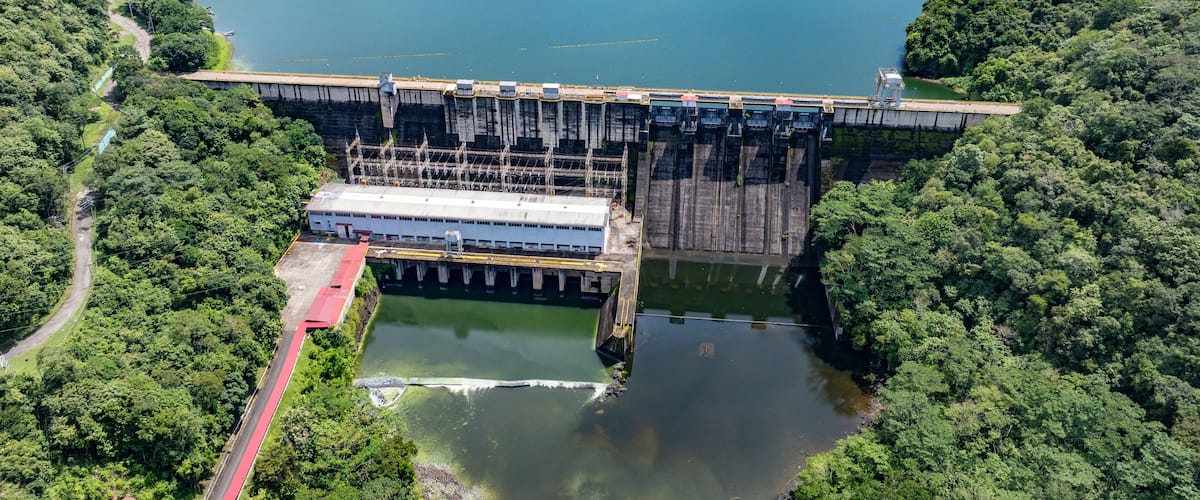 A hydroelectric dam with a control building and a lock system.