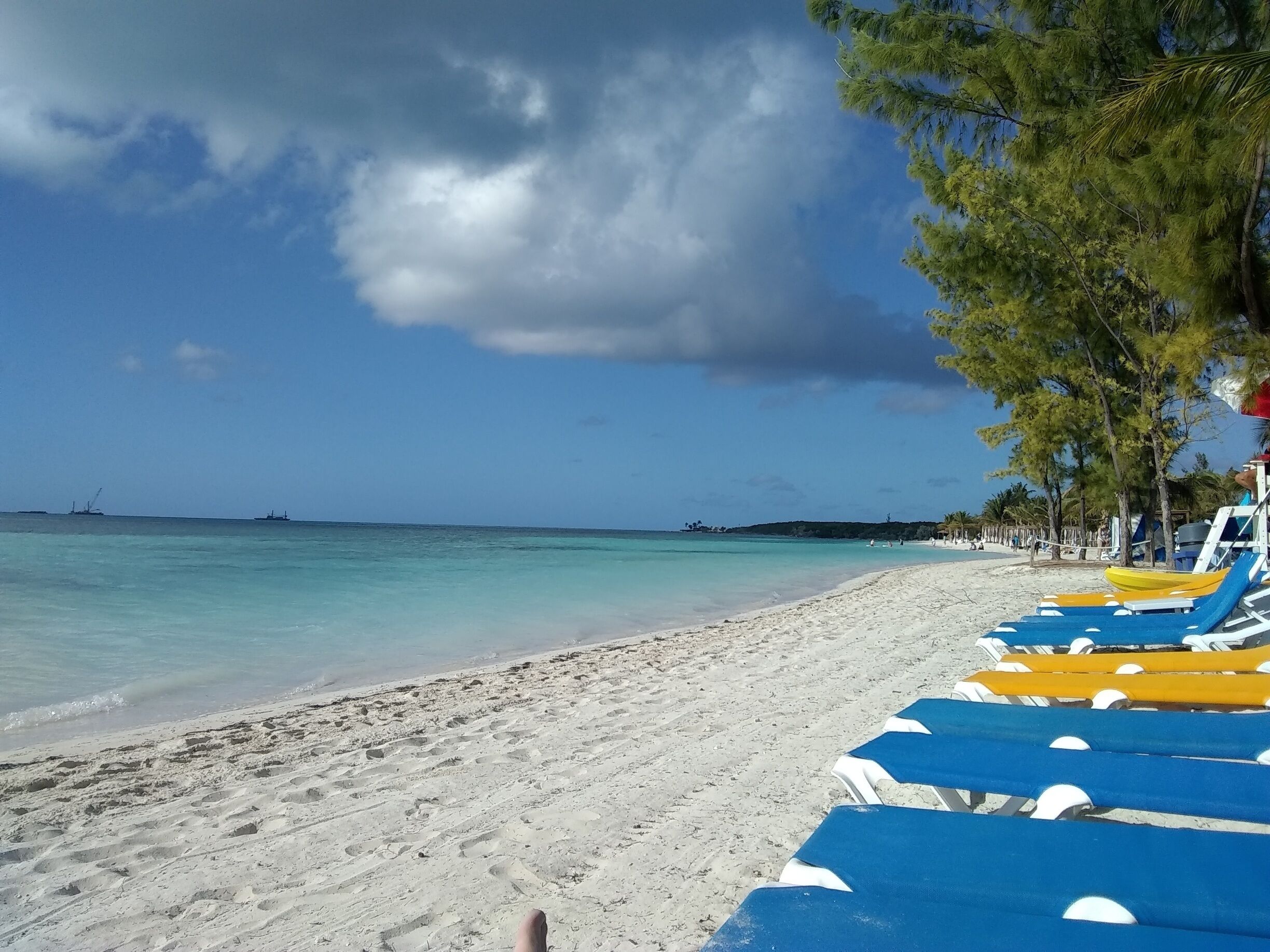Royal Caribbean's private island. Go all the way to the South side of the beach where the floating bar is. Less people, better view. Just do it. 