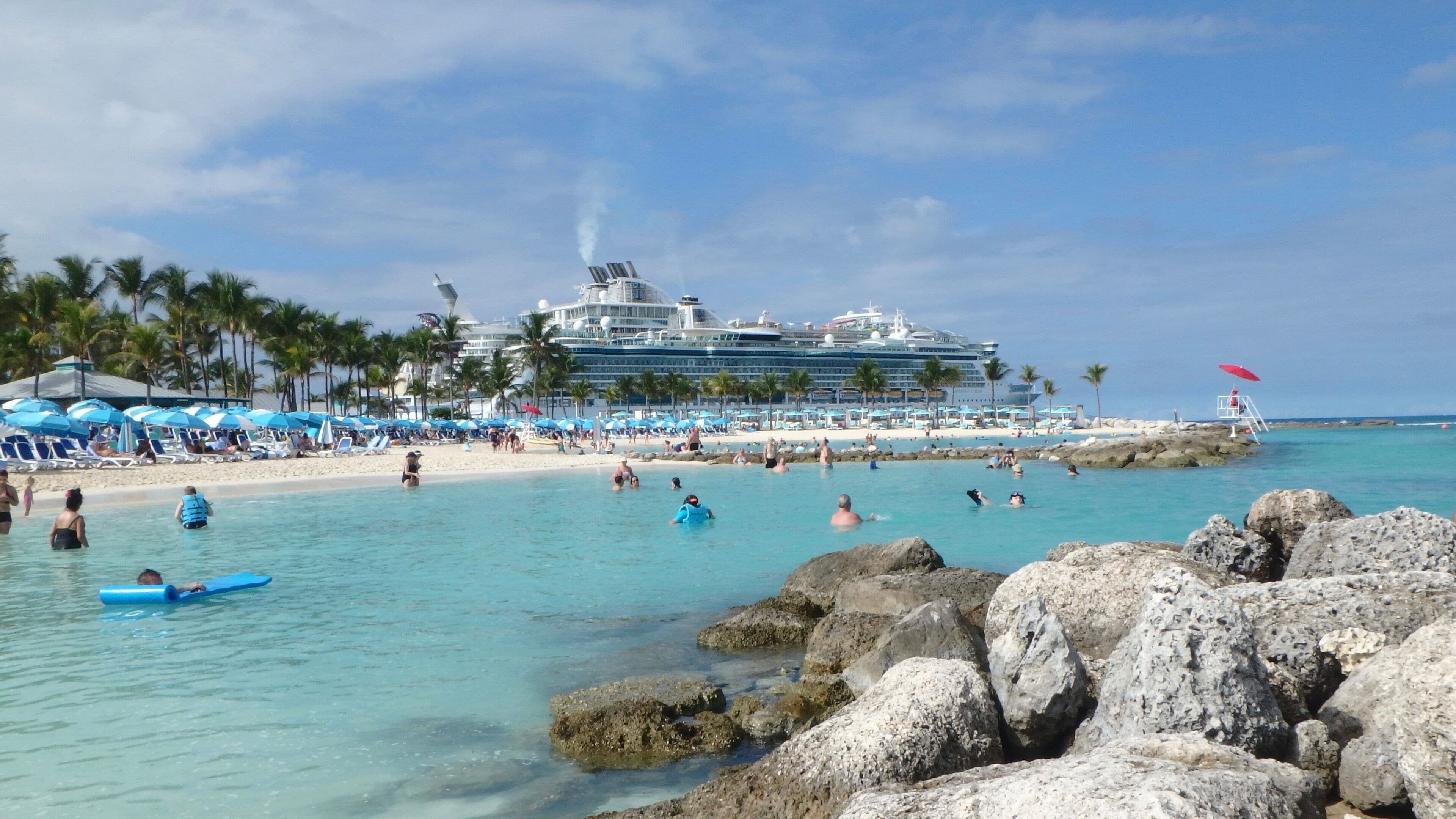 Cruise ships and swimmers at Coco cay Bahamas