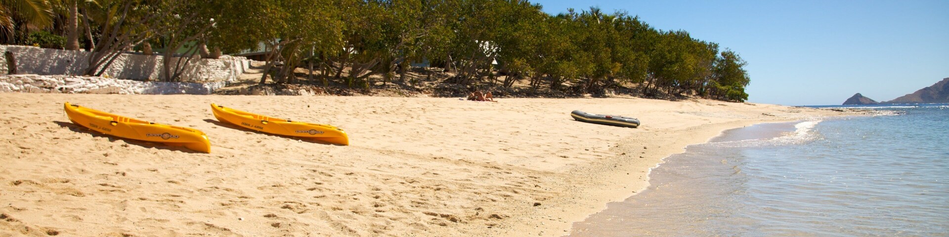 Fiji featuring tropical scenes, a sandy beach and landscape views