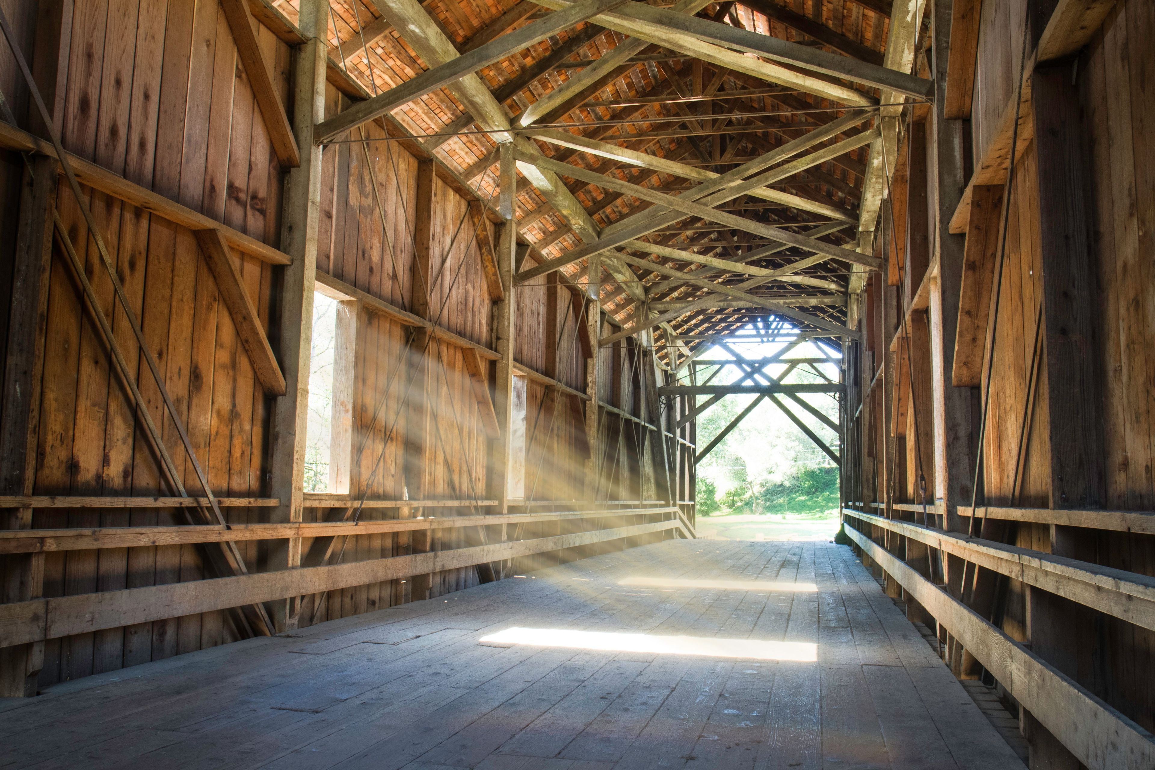 Low-angle of Felton covered bridge county park with sunlight from window