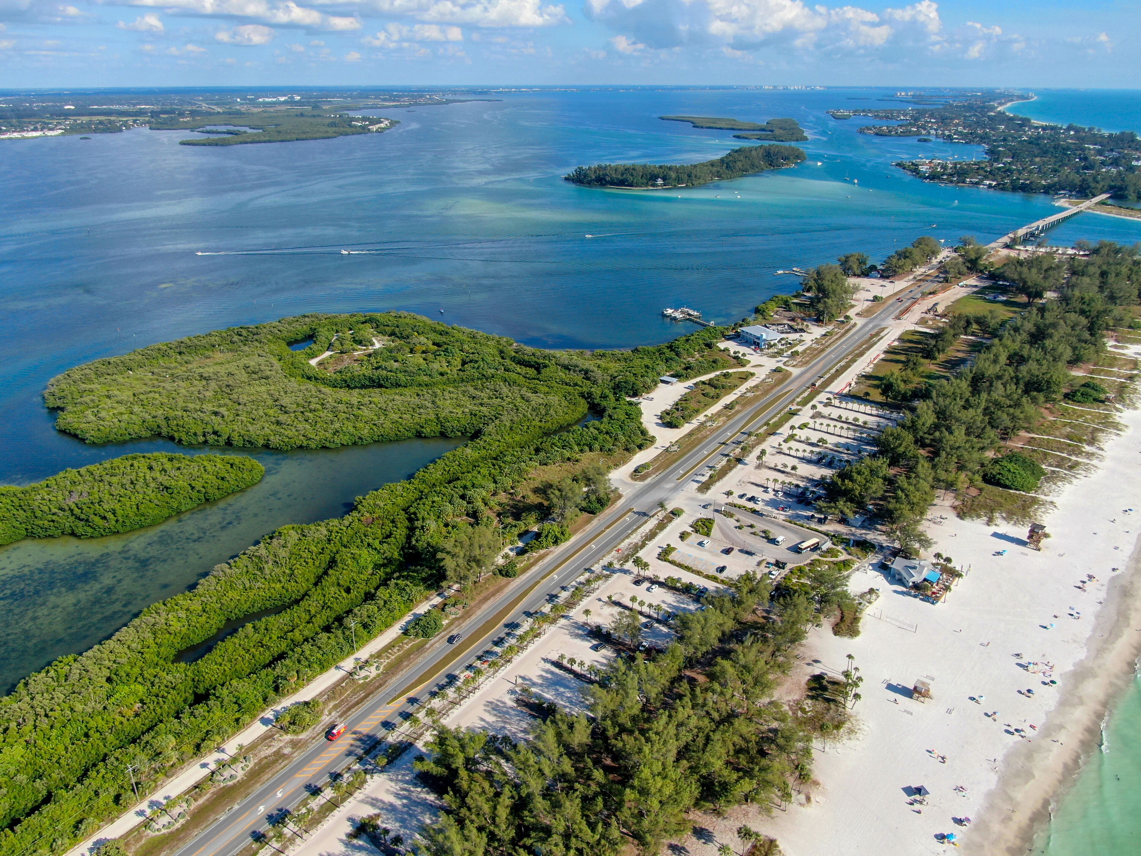 Aerial view of Coquina Beach with white sand beach and the main road, Anna Maria Island, Florida. USA
