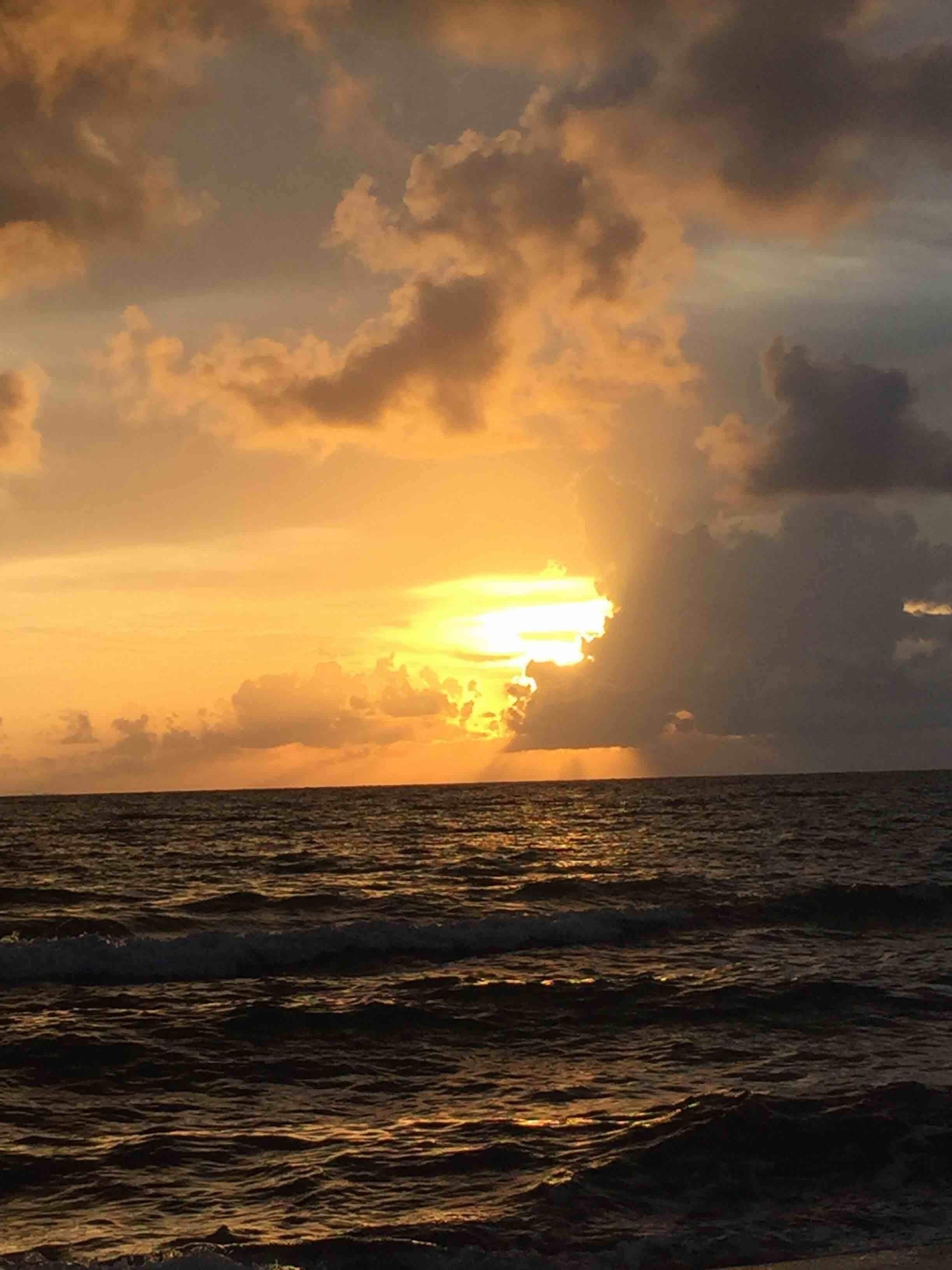 Sunrise over the Caribbean from the Green Parrot Beach Houses Resort