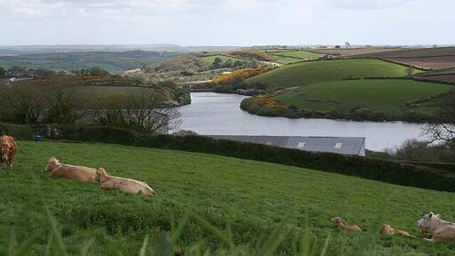 The View Over College Reservoir. This photograph is taken from a viewpoint on the road south of Antron as the road starts to drop down into the valley. It looks over and well beyond the grid square.
