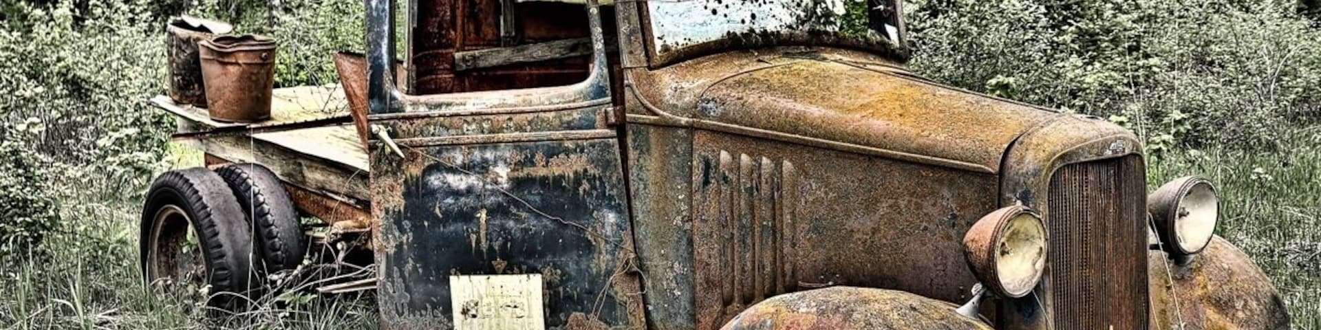 Some abandoned cars on the side of the road. Decay makes some of the best. HDR photos