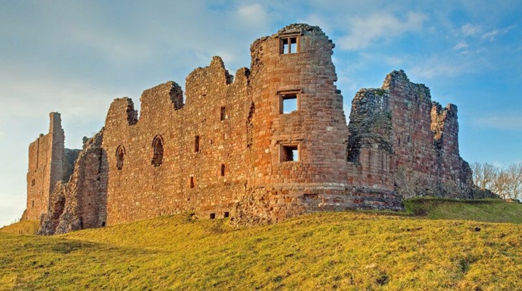 Brough Castle, near to Brough, Cumbria, Great Britain. Sun setting on the remains of Brough Castle