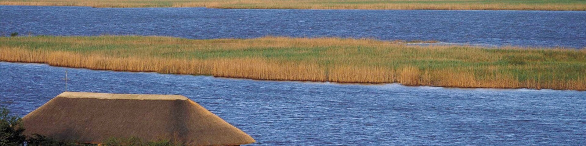 Hluhluwe que inclui paisagem, cenas tranquilas e pântano