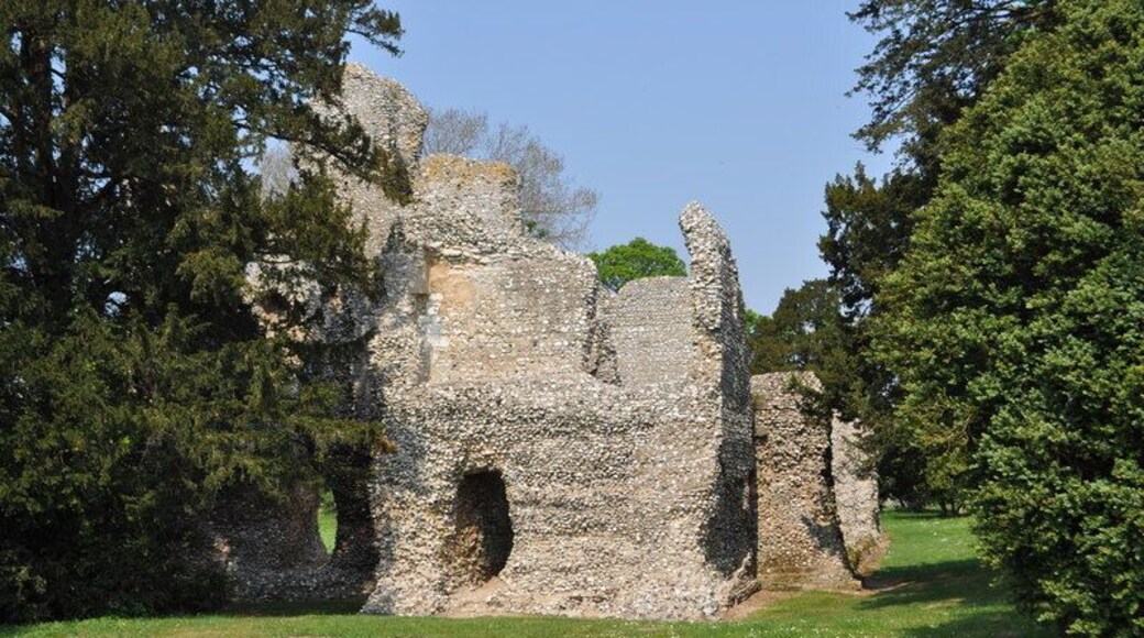 Weeting Castle, near to Weeting, Norfolk, Great Britain. Weeting Castle is a 12th-century ruin with a three-story-high tower in Weeting, near Brandon, Norfolk. Despite the name, it is not a castle but actually a fortified manor house. It has a large open hall and an attached two-storey chamber block. There's a domed brick ice-house on the northwest corner of the moat and a small car park next to the church. The moat was added in the 14th century. The place is thought to have been abandoned in 1390. The manor was built on a 10th C settlement. It is now owned by English Heritage. Entry is free and the location is open all year for visitors.