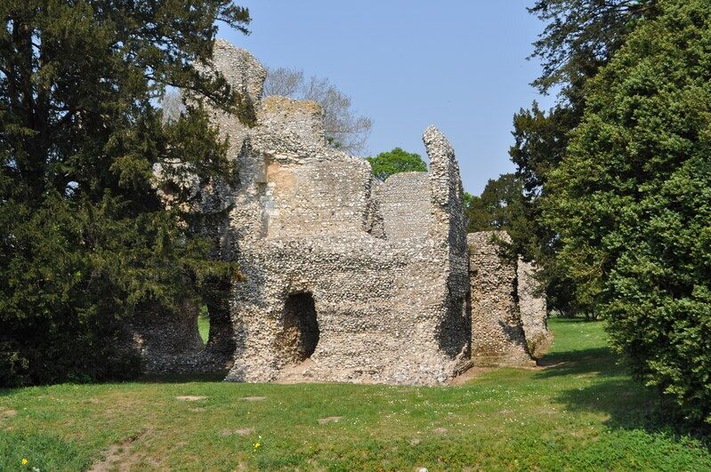 Weeting Castle, near to Weeting, Norfolk, Great Britain. Weeting Castle is a 12th-century ruin with a three-story-high tower in Weeting, near Brandon, Norfolk. Despite the name, it is not a castle but actually a fortified manor house. It has a large open hall and an attached two-storey chamber block. There's a domed brick ice-house on the northwest corner of the moat and a small car park next to the church. The moat was added in the 14th century. The place is thought to have been abandoned in 1390. The manor was built on a 10th C settlement. It is now owned by English Heritage. Entry is free and the location is open all year for visitors.
