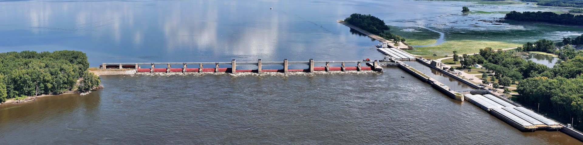 Panorama of Locks and Dam 13 on the Mississippi river at Fulton, IL loading the lock so a barge can proceed down river.