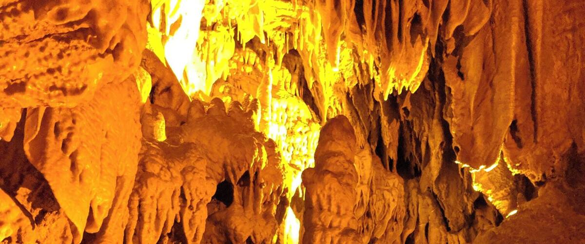 A cave with stalactites and stalagmites.