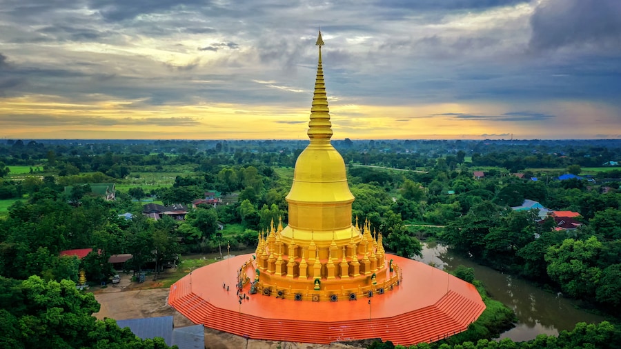 Wat Pa Wang Nam Yen. The biggest temple was mainly made of wood with 112 wooden pillars. A new pagoda has been building in the area of the temple. Maha Sarakham province. Thailand.