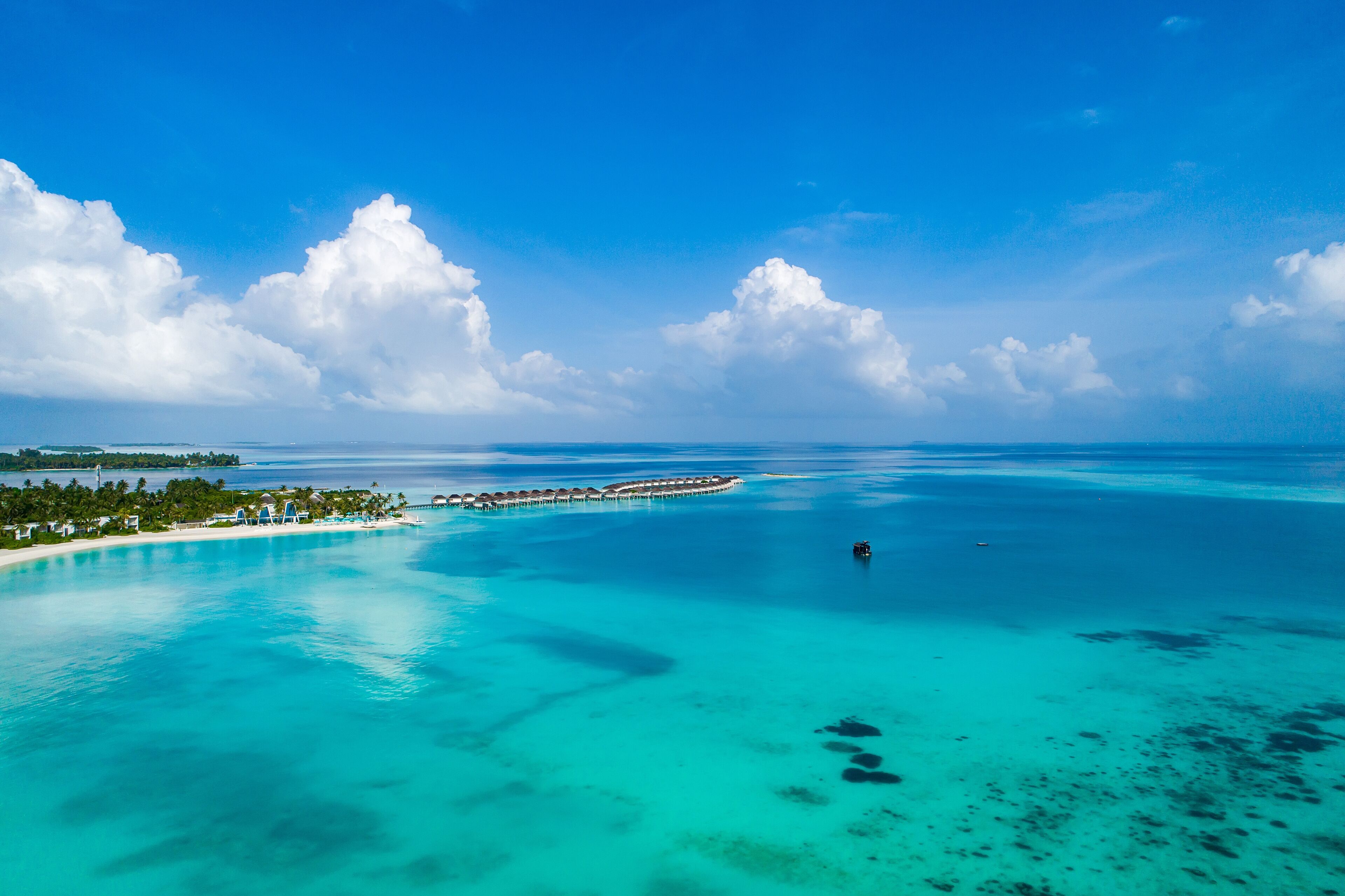 Aerial view of beautiful island at Maldives in the Indian Ocean. Top view from drone.