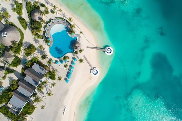 Aerial view of beautiful island at Maldives in the Indian Ocean. Top view from drone.