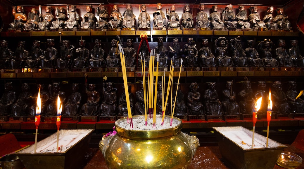Pak Tai Temple showing a temple or place of worship and interior views