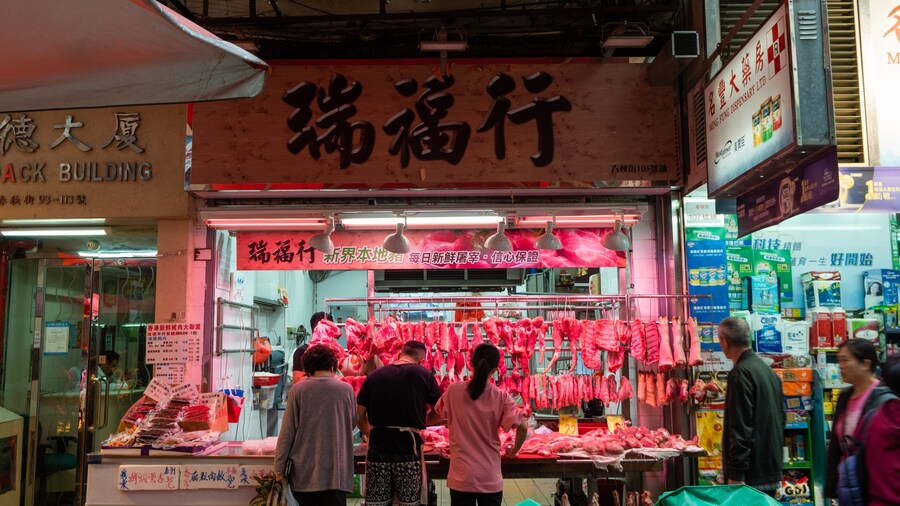 Chun Yeung Street Market featuring markets, food and signage