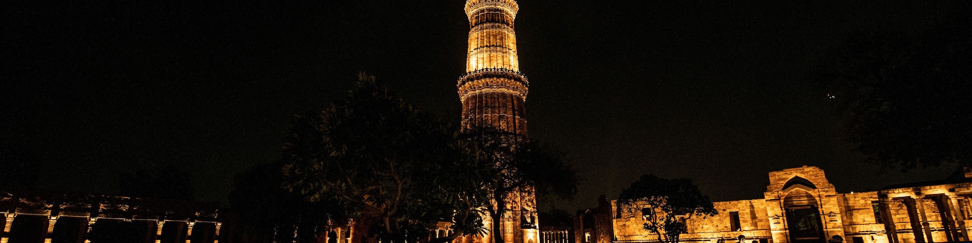 Illuminated Qutub Minar at Night, Delhi, India
