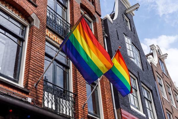 Gay rainbow flags in Reguliersdwarsstraat, Amsterdam, Netherlands
