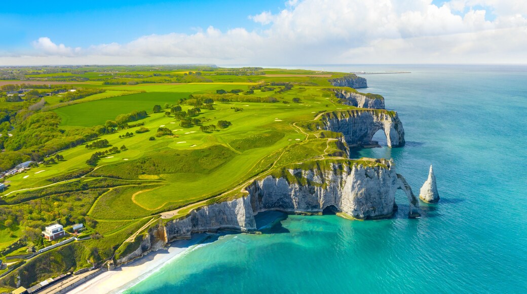 Picturesque panoramic landscape on the cliffs of Etretat. Natural amazing cliffs. Etretat, Normandy, France, La Manche or English Channel. Coast of the Pays de Caux area in sunny summer day. France