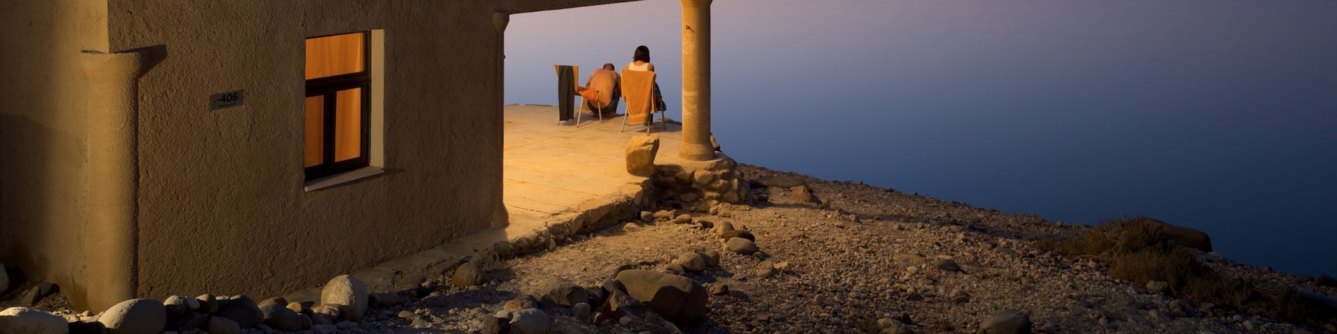 Mujib Nature Reserve featuring a house, general coastal views and a sunset