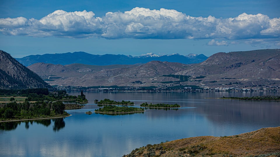 A lake surrounded by mountains and islands.