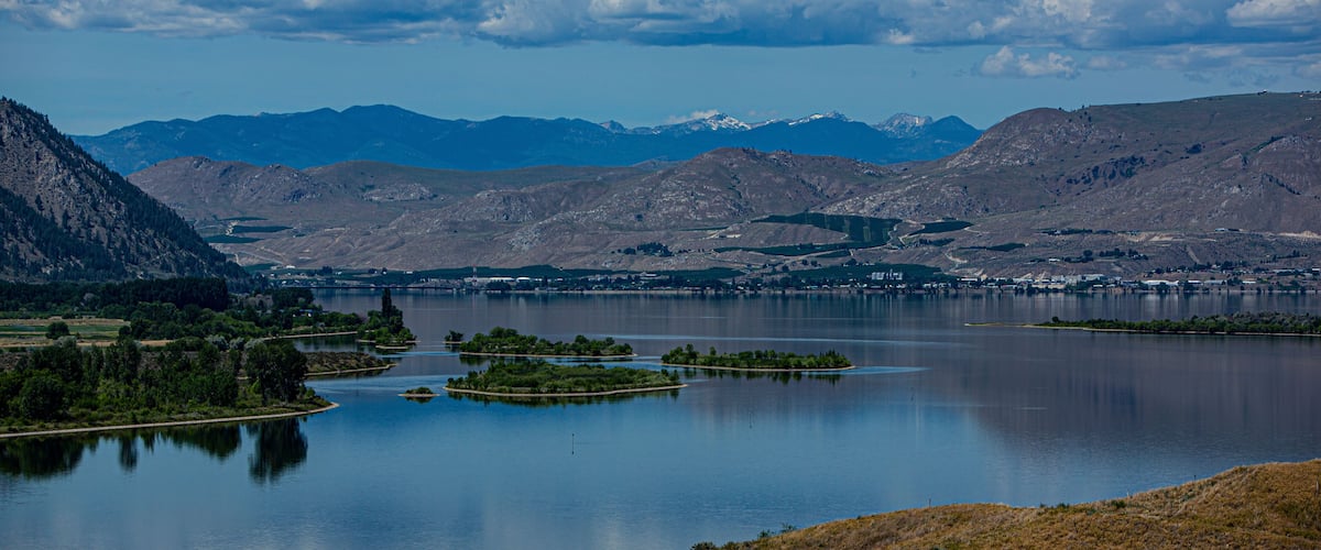 A lake surrounded by mountains and islands.