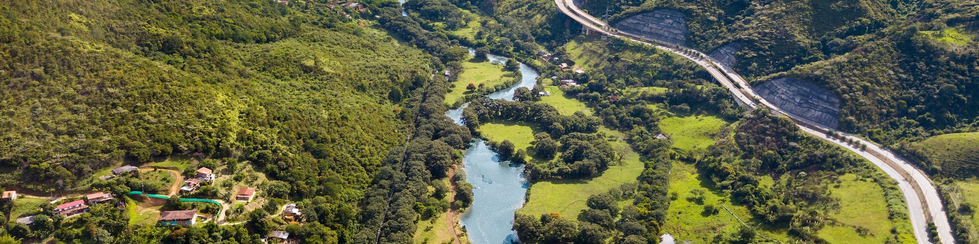 view of the valley of the mountains and river