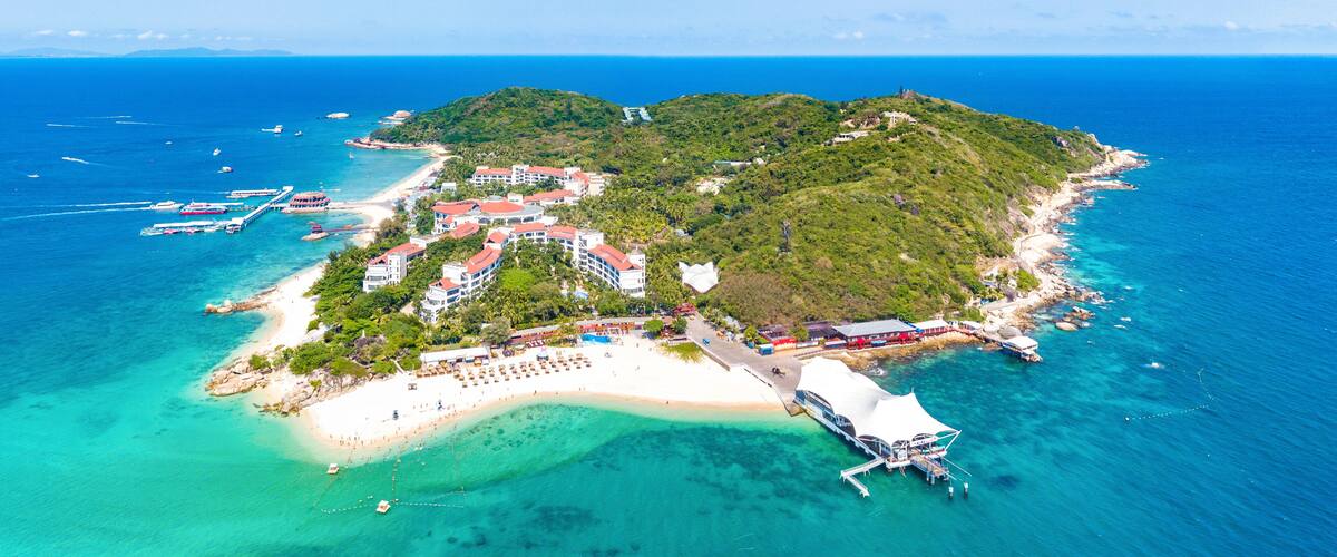 Wuzhizhou Island Aerial View, a Tropical Island Paradise with Resort and Recreational Beach for Sightseeing and Water Activities off the Shore of Haitang Bay, Sanya City, Hainan Province, China.