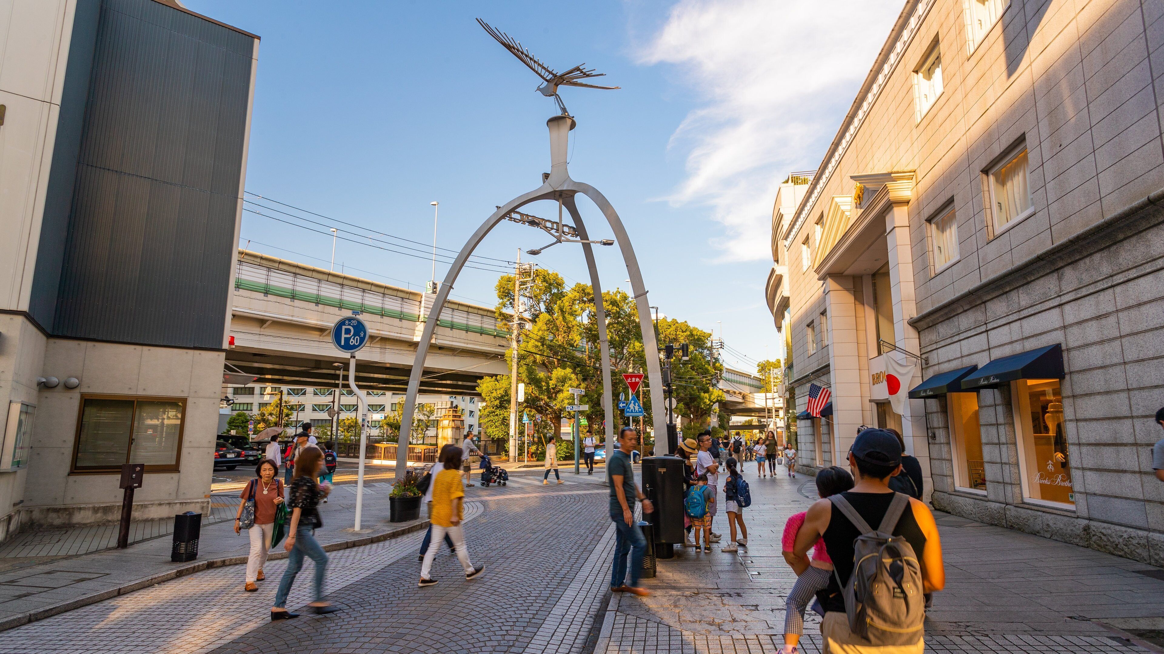 Motomachi Shopping Street showing outdoor art and street scenes
