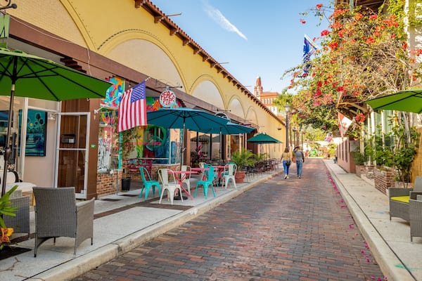 Aviles Street featuring street scenes as well as a couple