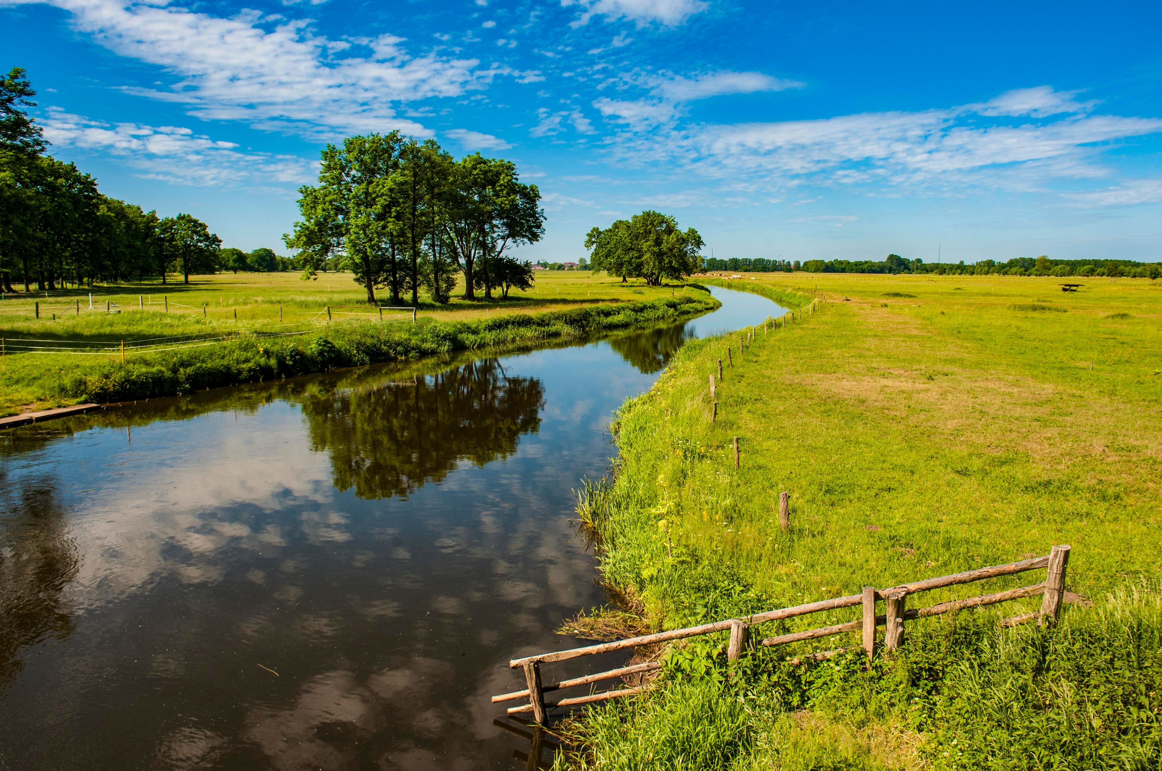 GERMANY, BRANDENBURG, unspoiled river Strepnitz meandering peacefully towards the bigger Elbe River near the village of Weisen