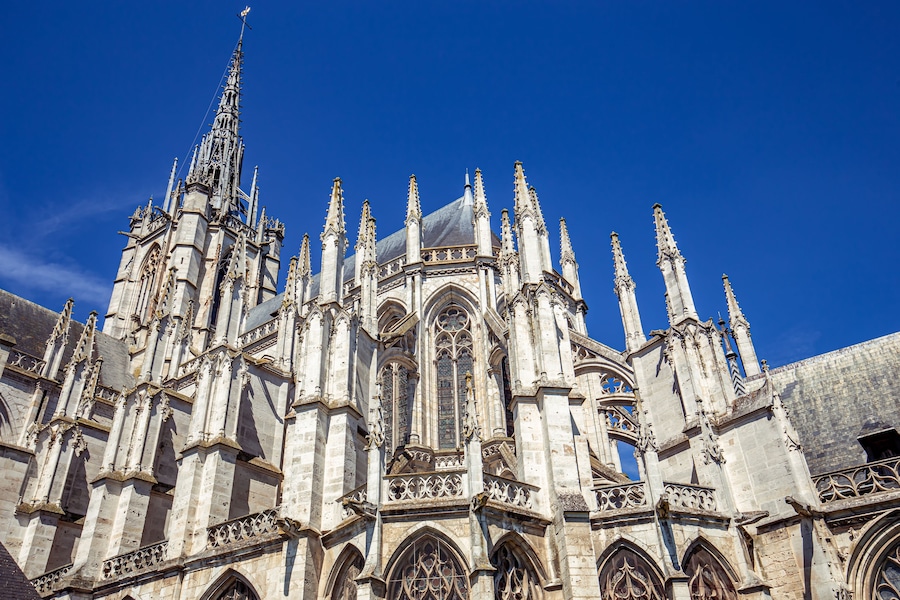 A Gothic cathedral with intricate spires and detailed stonework.
