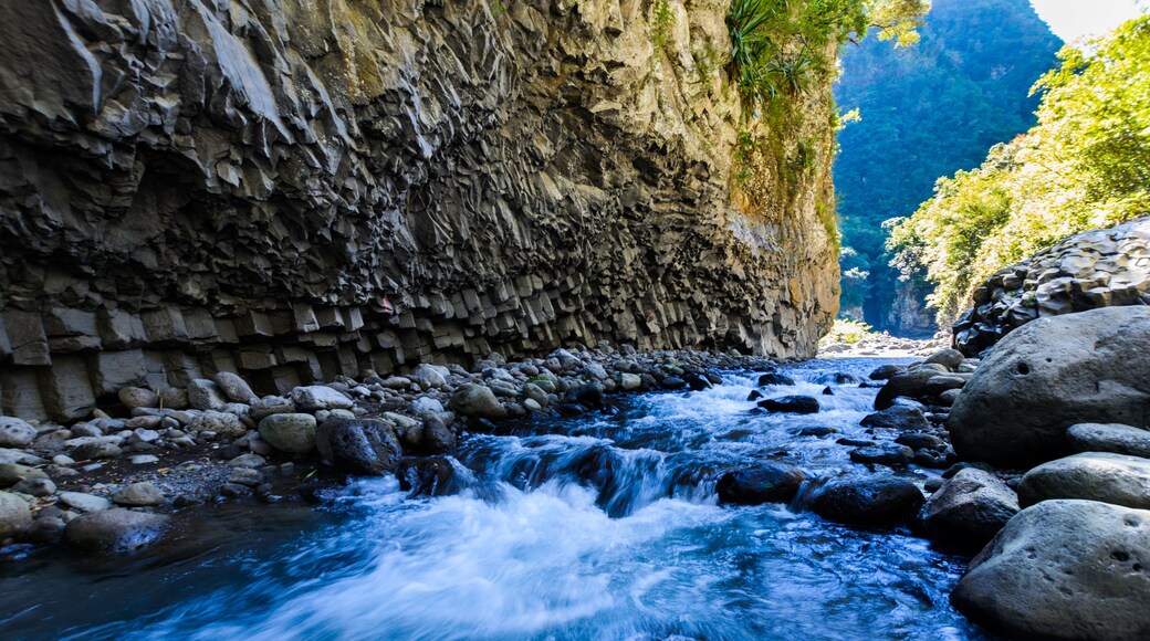 Hiking in a canyon of Bras de La Plain at Reunion Island