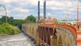 Stone Arch Bridge featuring a bridge and a river or creek