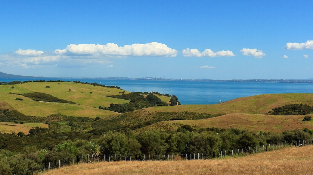 Scenic view (panorama) of Shakespear Regional Park and the Hauraki Gulf, with Rangitoto Island and Auckland City in the background, from Whangaparaoa Peninsula, Auckland, New Zealand