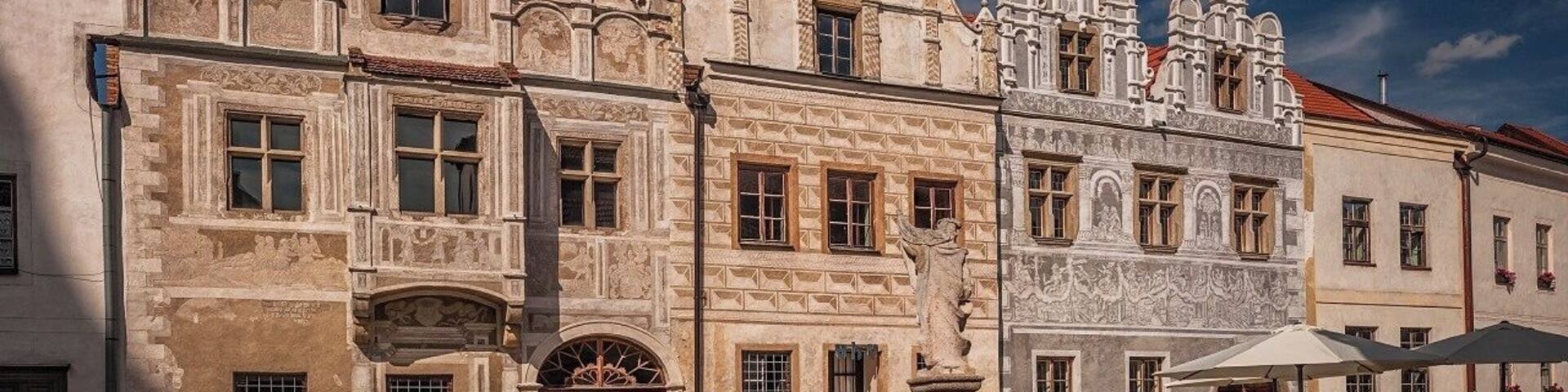 August 2017
Burgher houses, Slavonice, Czech republic
Slavonice is small town on the border of Moravia, South Bohemia and Austria. Its distance from other places preserved its medieval Renaissance city centre look through centuries to date.
Its heyday was in 14th to 16th centuries when it was an important town on the route from Prague to Vienna.
In the picture you can see two most beautiful burgher houses (Nr. 518 on the left and 517 on the right). The one on the left has actually two facades so it looks like there are three houses. They have been Gothic originally but were rebuilt in 1559 in distinguished Renaissance style. All of them have exquisite facades decorated with Sgrafitto paintings and an oriel. The houses are situated on the Upper square opposit a baroque fountain of Saint Florian built in 1783.