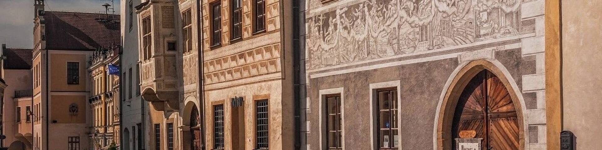 August 2017
Burgher houses, Slavonice, Czech republic
Slavonice is small town on the border of Moravia, South Bohemia and Austria. Its distance from other places preserved its medieval Renaissance city centre look through centuries to date.
Its heyday was in 14th to 16th centuries when it was an important town on the route from Prague to Vienna.
In the picture you can see two most beautiful burgher houses (Nr. 518 on the left and 517 on the right). The one on the left has actually two facades so it looks like there are three houses. They have been Gothic originally but were rebuilt in 1559 in distinguished Renaissance style. All of them have exquisite facades decorated with Sgrafitto paintings and an oriel. The houses are situated on the Upper square opposit a baroque fountain of Saint Florian built in 1783.