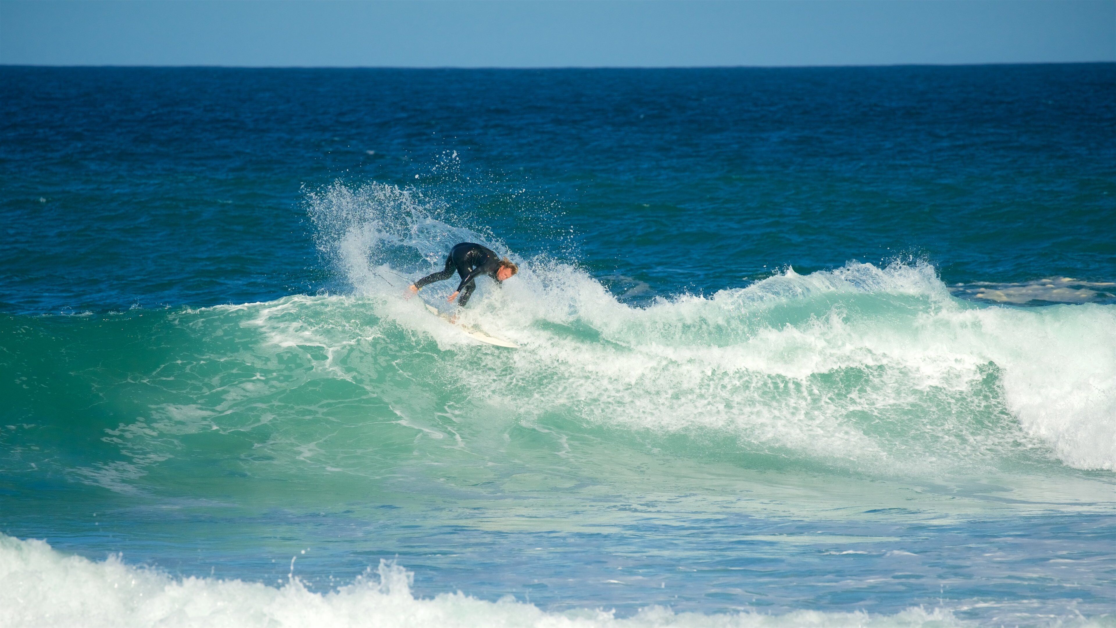 Victoria Bay showing waves, surfing and general coastal views