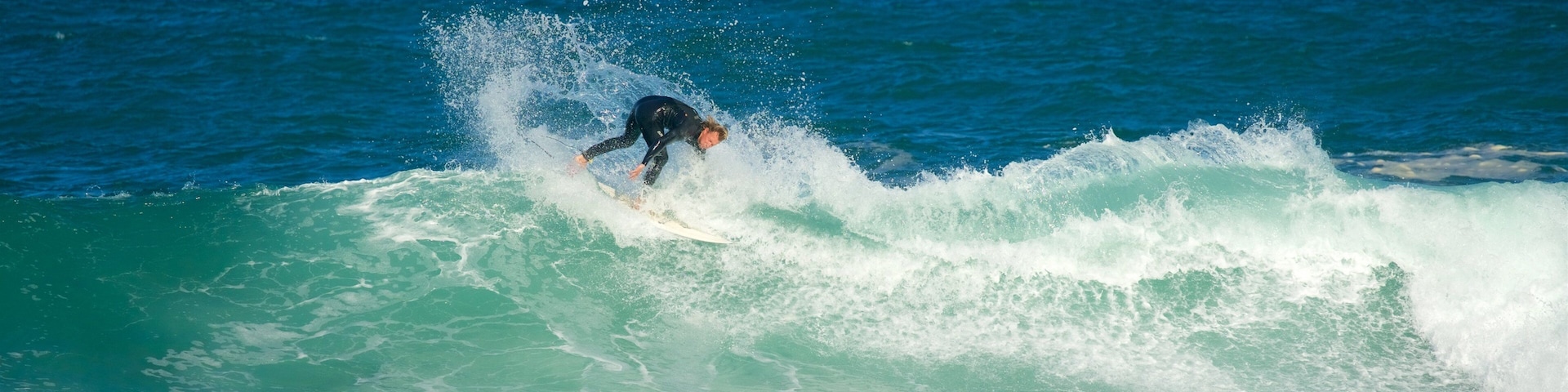 Victoria Bay showing waves, surfing and general coastal views