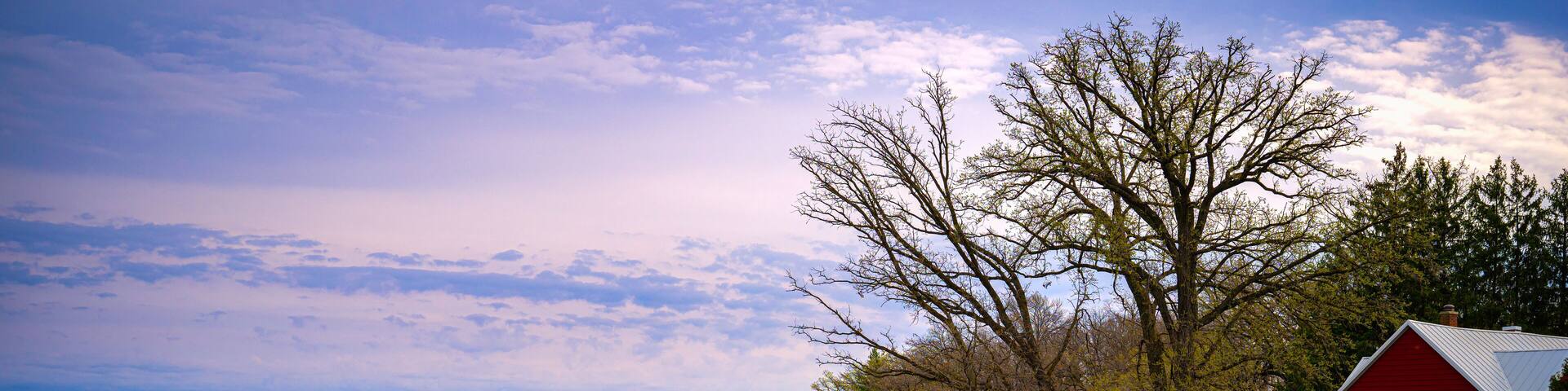 Boathouse and stacked kayaks over the green park at the Lake Monona in Madison, Wisconsin, USA