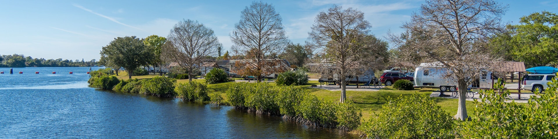 Campers Along shore of River