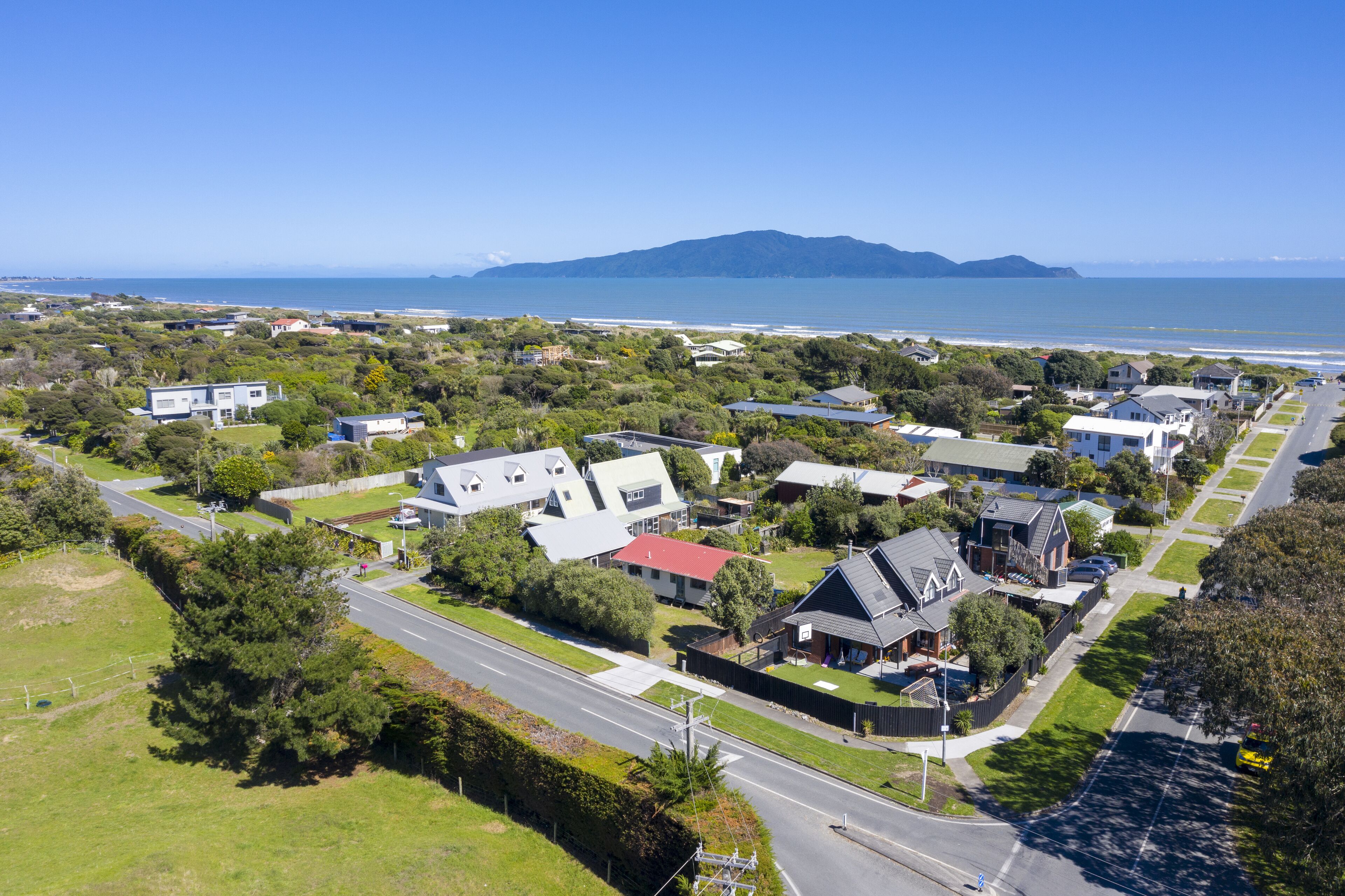 aerial shot Peka Peka village  also showing kapiti Island