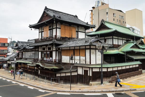 Dogo Onsen showing heritage elements and a city