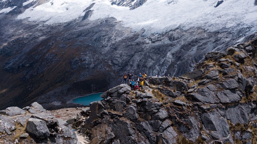 Team posing for the epic shot in Punta union pass in the Peruvian Andes