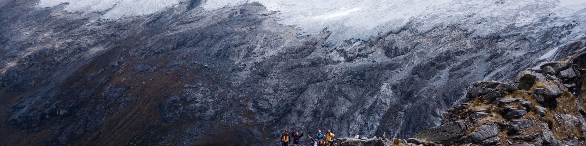 Team posing for the epic shot in Punta union pass in the Peruvian Andes
