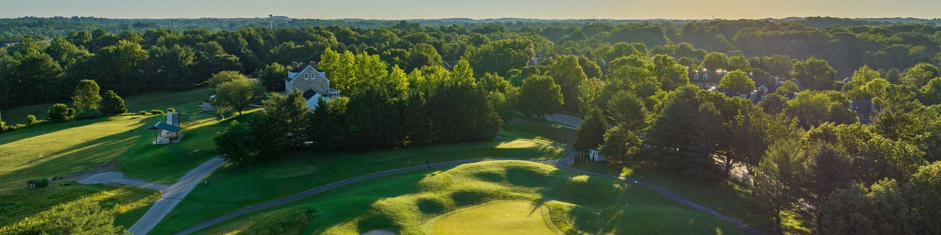 Aerial view of natural green fairway at Fairway Hills Golf Course, Columbia, Maryland, United States.