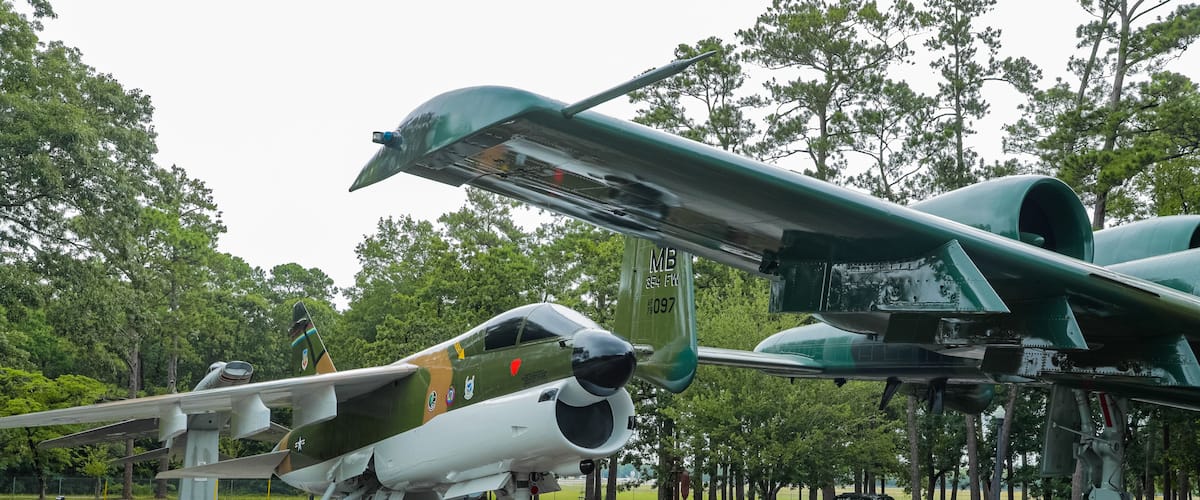 Warbird Park showing aircraft and military items