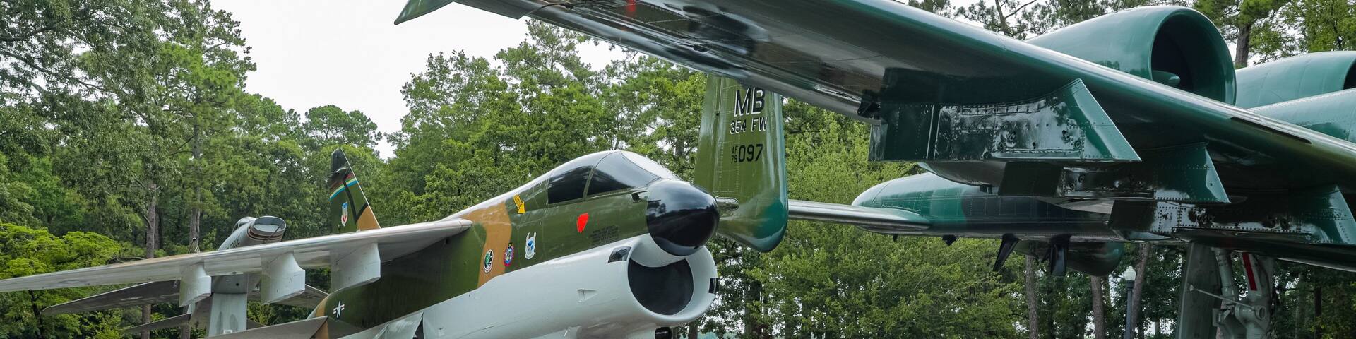 Warbird Park showing aircraft and military items