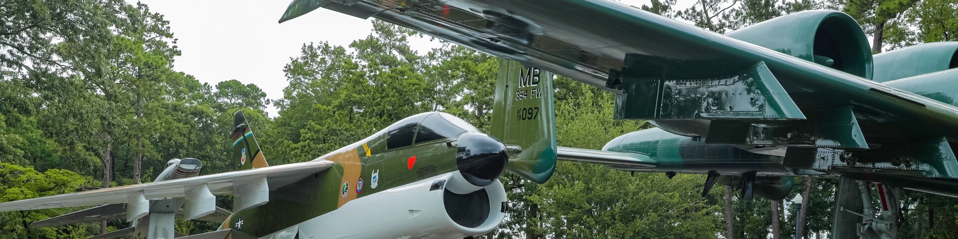 Warbird Park showing aircraft and military items