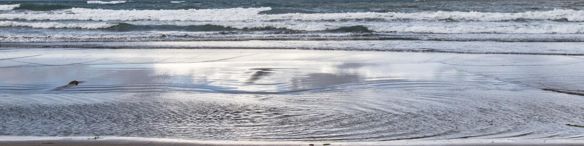Cloudy day at the beach with no people. Touristic Tecolutla beach in Veracruz, Mexico.